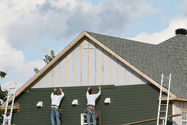 Professional Siding Installation technician working in Sharon Center, OH